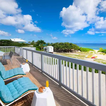 Timmys Place - Charming Oceanfront Villa With Direct Beach Access And Scenic Views